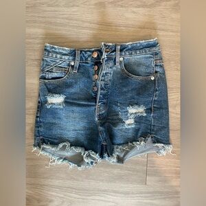 Free people we the free high waisted denim dark blue distressed shorts